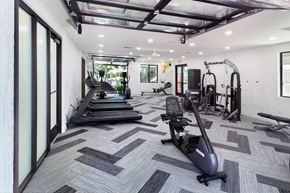 Spokane Valley apartment for rent - a workout room with treadmills and other exercise equipment