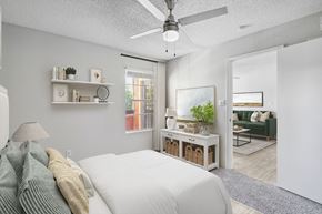 El Paso apartment for rent - a bedroom with a bed and a ceiling fan