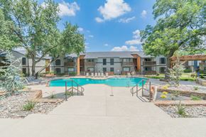 Dallas apartment for rent - the preserve at ballantyne commons pool and community buildings with trees