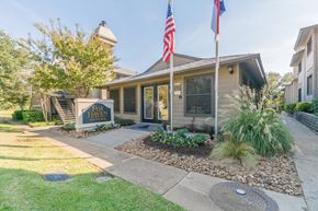 Frisco apartment for rent - a house with an american flag in front of it