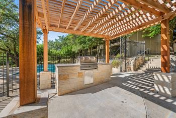 Pergola with pool in the background