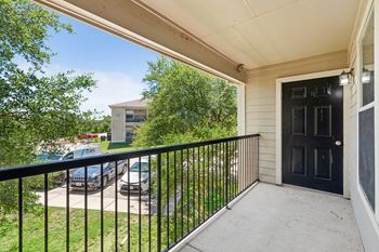 Balcony with a black door