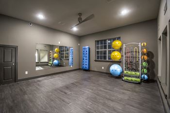 24 Hour fitness center w/ yoga room