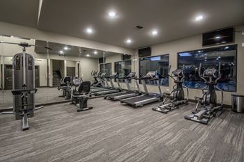 24 Hour fitness center w/ yoga room