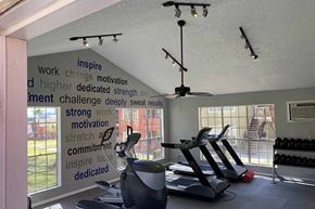 El Paso apartment for rent - a gym with a row of exercise machines