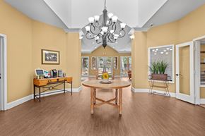 Weatherford apartment for rent - a dining room with a table and a chandelier at Southgate Glen, Texas