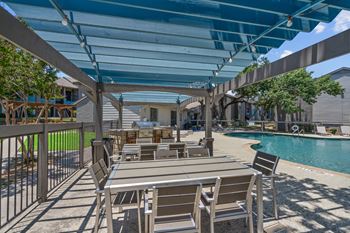 Take a dip in the pool at villas at houston levee west apartments in cord