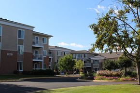 Chanhassen apartment for rent - Front of Centennial Hill with the number 820 on the building.