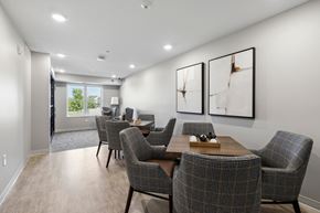 Carver apartment for rent - Library room with tables and chairs.