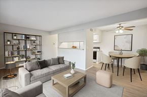 Flushing apartment for rent - a living room with a couch and a table