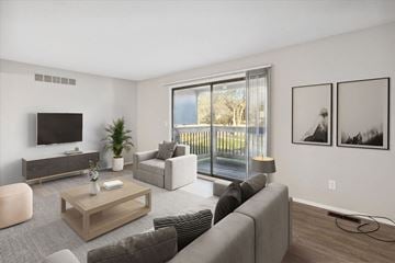 Flushing apartment for rent - a living room with a couch and a tv