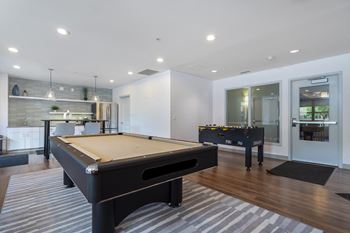 Community room w/pool table & foosball.