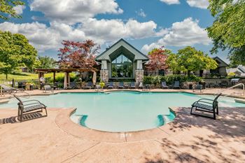 Two sparkling resort style pools with sundeck