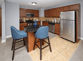 Cleveland apartment for rent - A kitchen with a table and two chairs.
