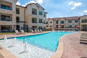 Resort style pool with spa and sundeck