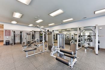 Fitness center with cable machines and exercise equipment