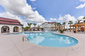 Del Valle apartment for rent - Resort style pool with covered cabana and pergola at Eastridge Apartments, Del Valle, TX