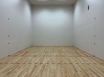 A racquetball court in a gym