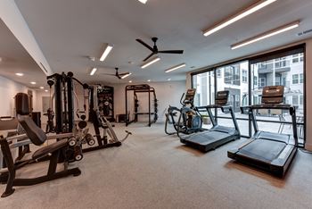 Fitness center with cardio equipment and strength machines 1