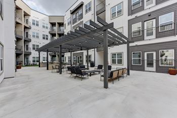 Courtyard with pergola and modern outdoor furniture