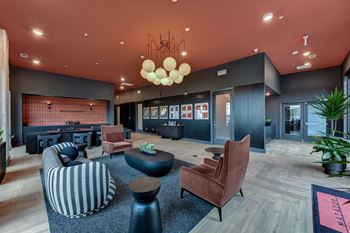 Modern lobby with coral ceiling and contemporary seating