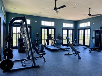 24-Hour fitness center at three hills apartments