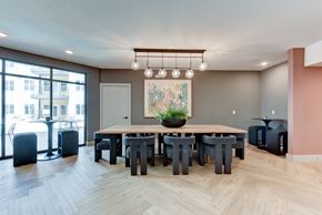 Austin apartment for rent - A dining room with a large table and chairs. at Park South Apartments, Austin, TX