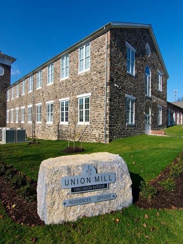 Baltimore apartment for rent - A stone sign in front of a building that says Union Mill.