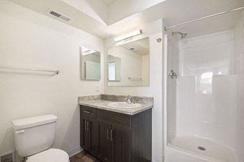 A second bathroom with a walk in shower