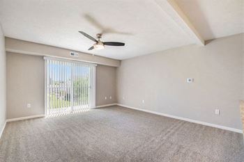 Living room with 9' ceiling and ceiling fan