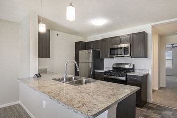 Kitchen with built-in microwave
