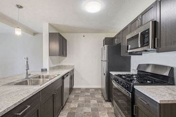 Kitchen with stainless steel appliances offered 