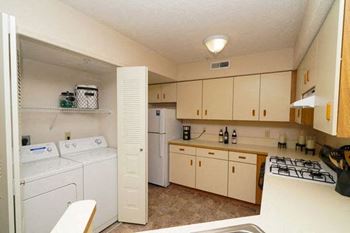 Kitchen with washer/dryer