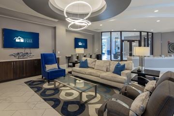 Carmel apartment for rent - a living room with couches and a glass coffee table