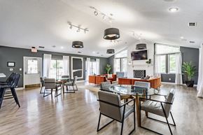 Indianapolis apartment for rent - A modern dining room with a glass table and chairs