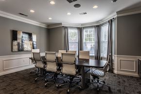 Fishers apartment for rent - a conference room with a table and chairs and windows at Bella Vista Apartments, Fishers, IN