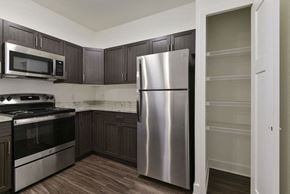 Huntsville apartment for rent - Built In Microwave and Pantry In Kitchen at Chase Creek Apartment Homes, Alabama, 35811