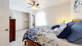 Maize apartment for rent - Spacious bedroom with ceiling fan and walk-in closet at Copper Creek Homes Apartments, Kansas