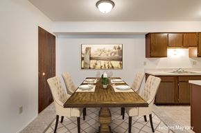 Rockford apartment for rent - A dining room with a wooden table and chairs at Beacon Hill and Great Oaks Apartments, Rockford, Illinois