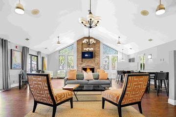 Lafayette apartment for rent - a living room with a couch and chairs and a fireplace