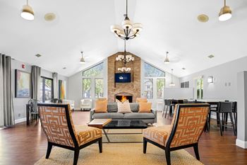 Spacious clubhouse with fireplace and tv seating