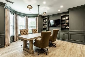 Conference table and tv in business center 
