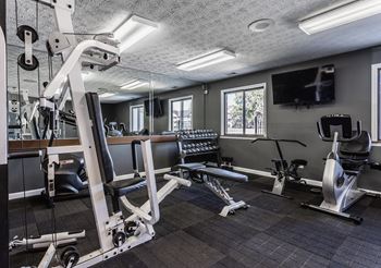 A gym with exercise equipment 