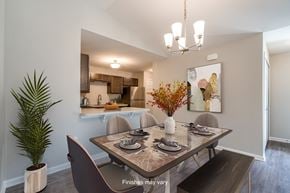 Columbia townhouse for rent - a dining room with a table and chairs and a kitchen  at Killian Lakes Apartments and Townhomes, South Carolina