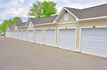 A row of garages with a garage door