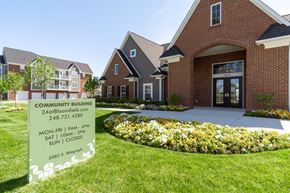 Bloomfield Township apartment for rent - Resident Clubhouse with Hours Sign at 24 at Bloomfield, Bloomfield Township
