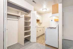 Mishawaka apartment for rent - a kitchen with white appliances and a white stove top oven at Hickory Village Apartments, Mishawaka, 46545
