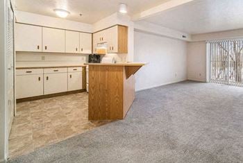 One bedroom kitchen with white appliances