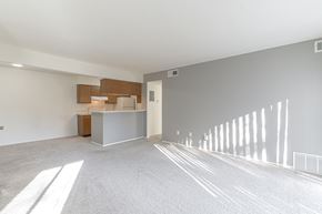 Farmington Hills apartment for rent - A spacious room with a reception desk and a white wall.