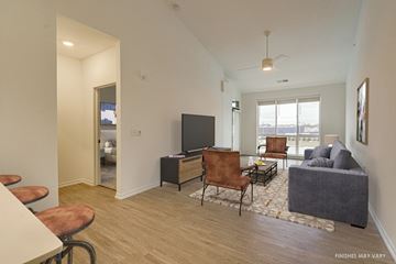Troy apartment for rent - a living room with hardwood flooring and a flat screen tv